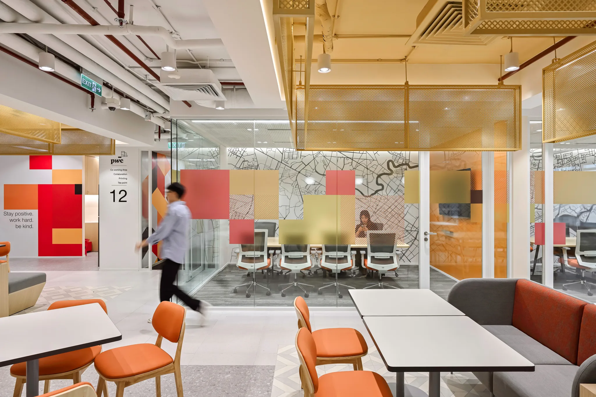 <figcaption>PWC Office by ADP leverages the brand color palette to enhance the brand essence in the workplace while strengthening the company's spirit.</figcaption>